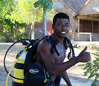 Samuel carries his gear - 