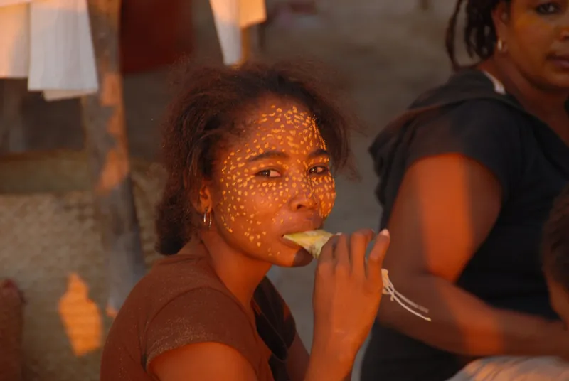  Woman face wearing a tabaky beauty mask, sunset light